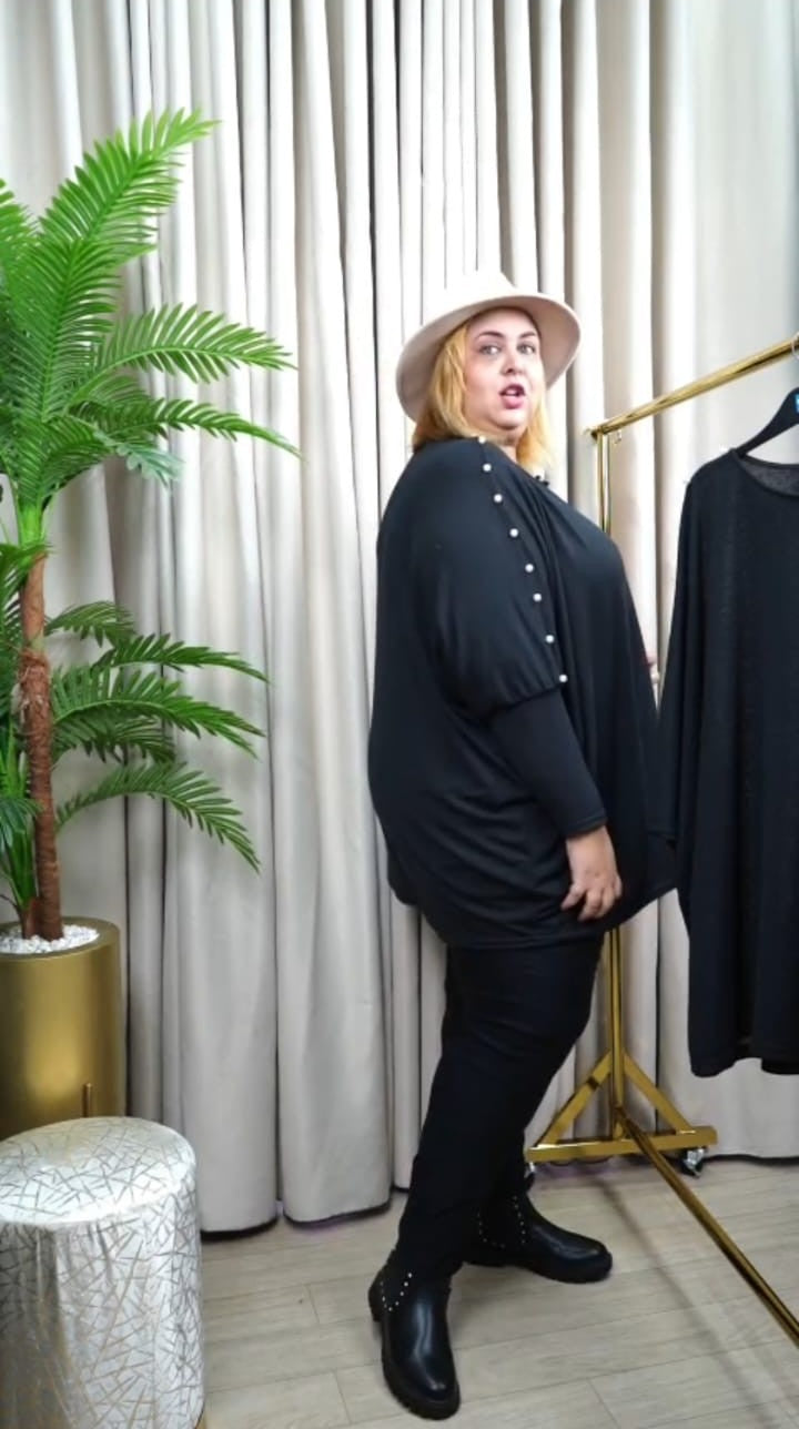 Pull en maille fluide oversize, col rond.